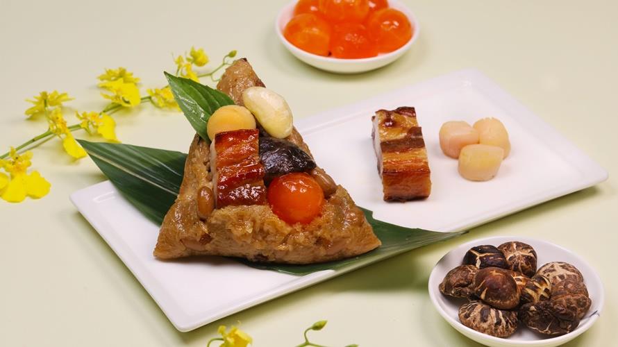 皇豪中餐廳於佳節前夕推出「粽豪千里端午禮盒」以及素食口味的「粽情粽意端午禮盒」,5月20日前預購享95折。(圖/高雄萬豪酒店提供)